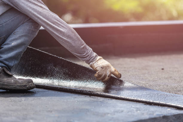 Professional Basement Waterproofing technician working in Beltsville, MD